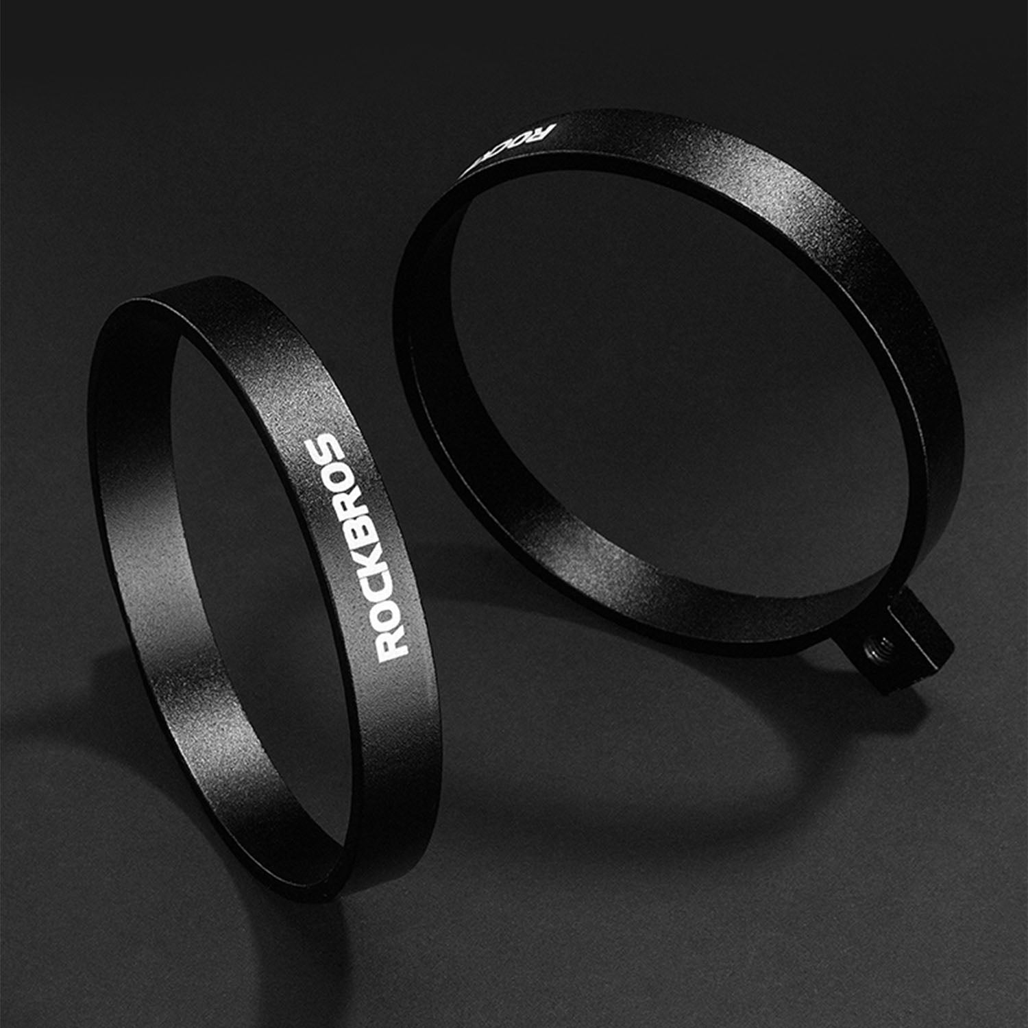 Image of two aluminium cup holders next to each other