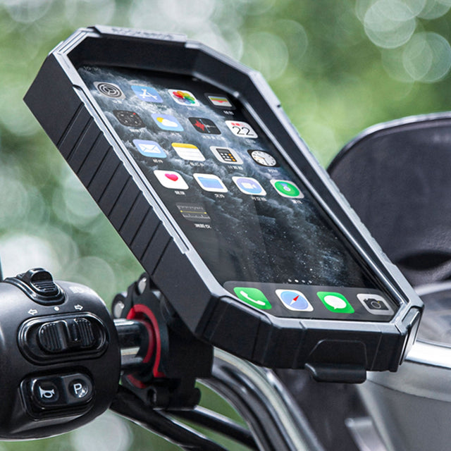 Image of the rainproof mobile phone holder attached to the handles of a bike outdoors