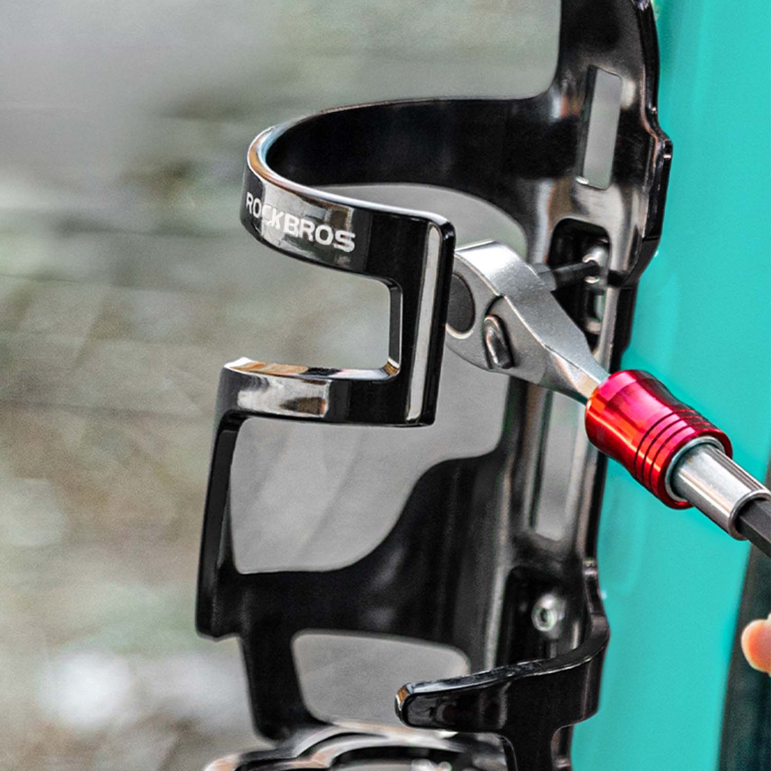 Image of the ratchet wrench being used to attach a frame mounted bottle holder