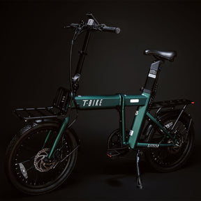 front off-angle Image of the Green CITY 250 folding E-Bike displaying the built in lights and luggage racks