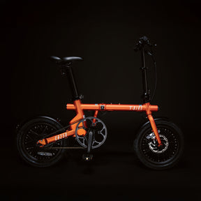 Image of the orange Compact Rider 250 viewed from the side